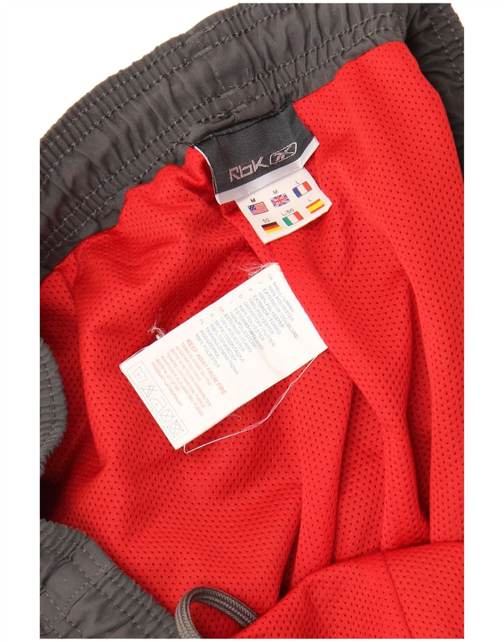 Pantaloni da tuta REEBOK da uomo in poliestere grigio medio