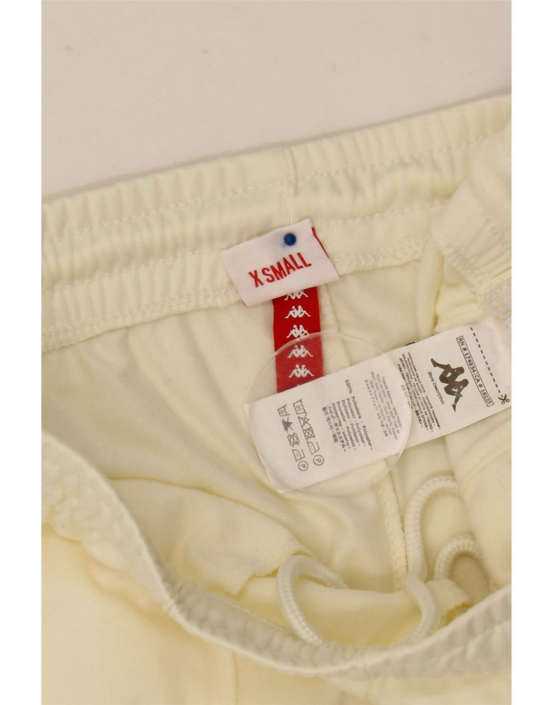 Pantaloni da tuta con grafica Kappa da uomo Joggers XS poliestere bianco sporco
