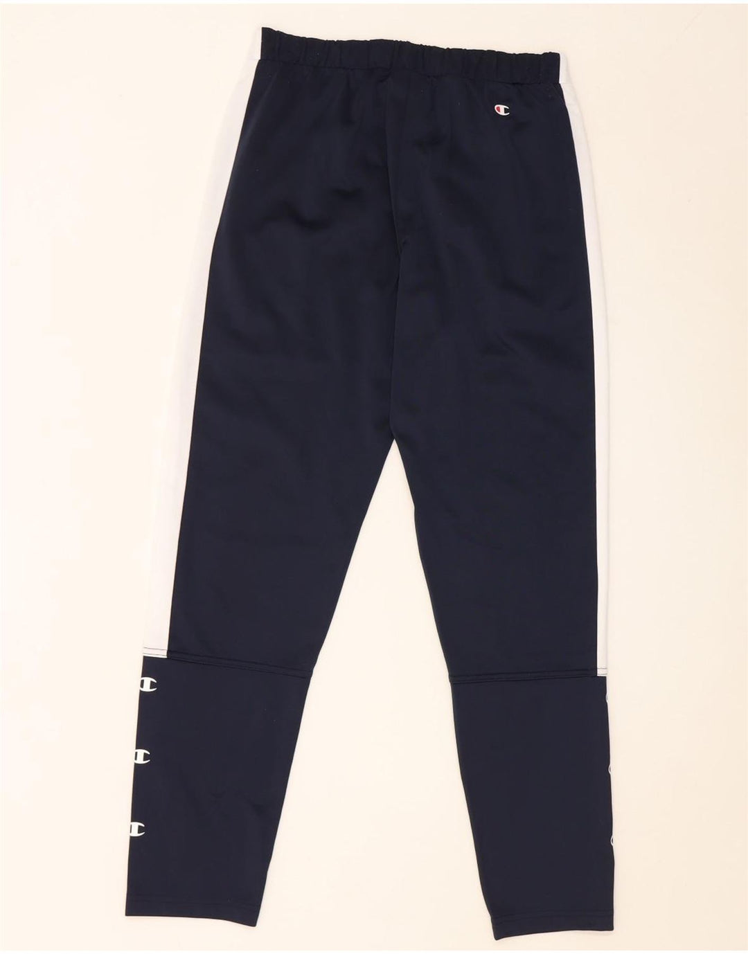 Pantaloni da tuta con grafica Champion da uomo piccoli color block blu navy