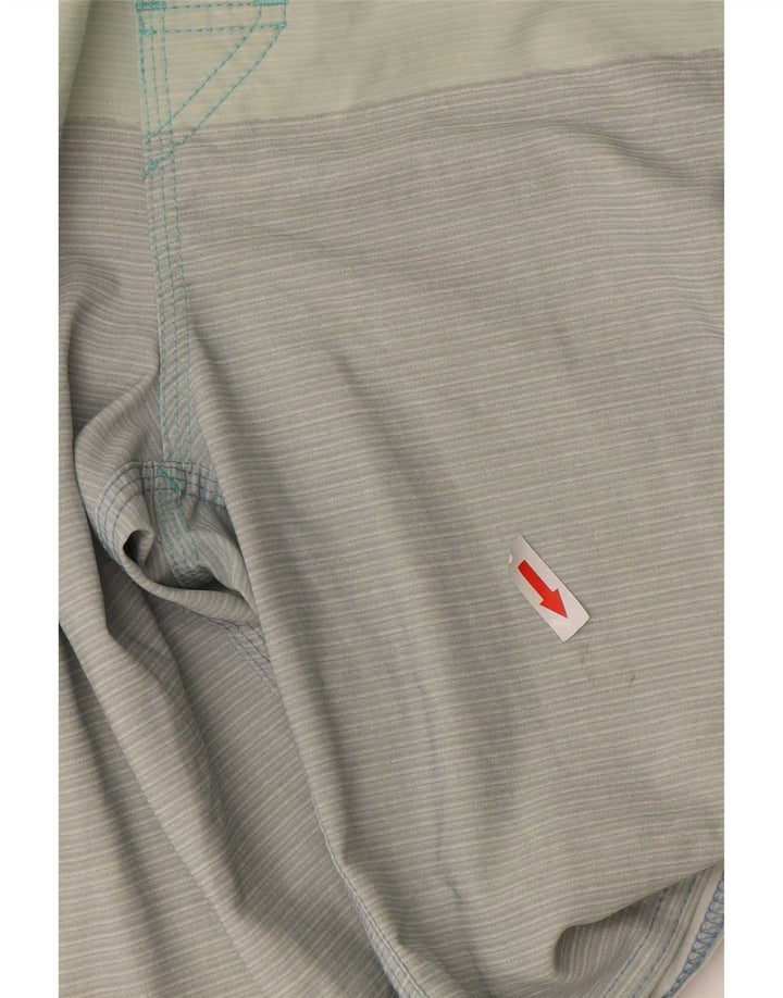 Pantaloncini da bagno da uomo Rip Curl verde medio color block