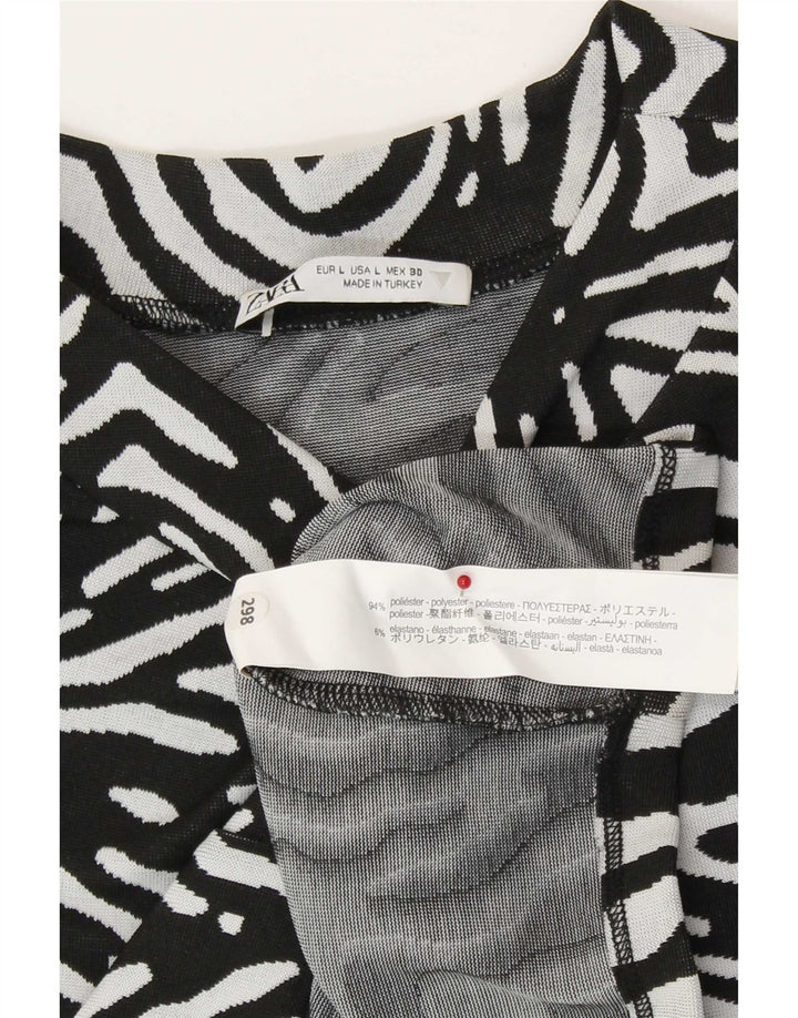 Canotta corta da donna Zara UK 14 grande poliestere nero con stampa animalier
