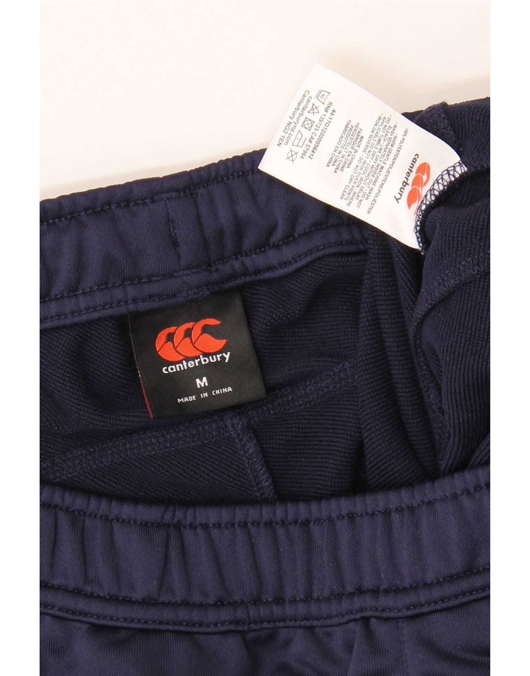 Pantaloni da tuta con grafica da uomo Canterbury, poliestere medio blu navy