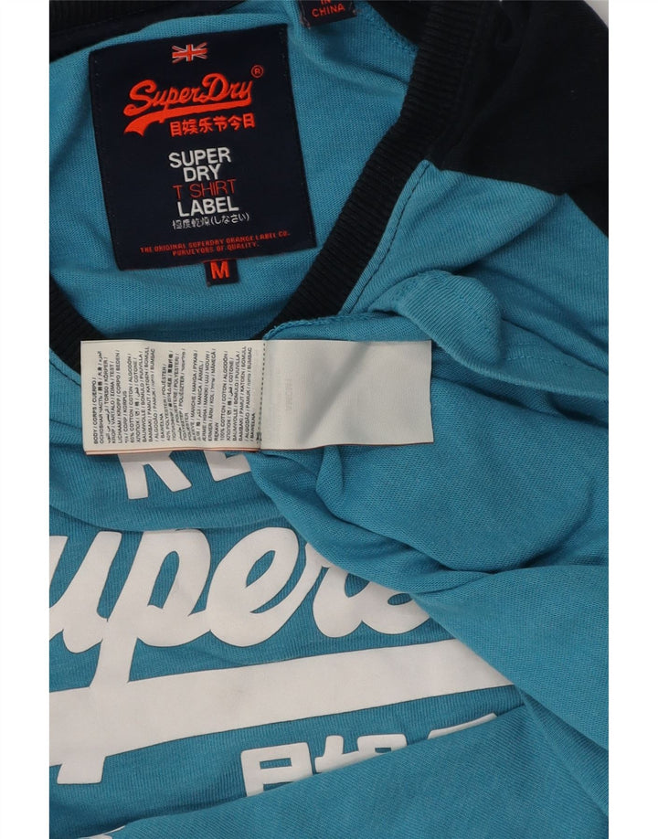 Top grafico da uomo Superdry a maniche lunghe in cotone color block blu medio