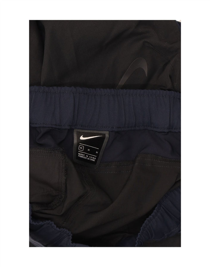 Pantaloni cargo affusolati da uomo NIKE medi W32 L27 color block nero