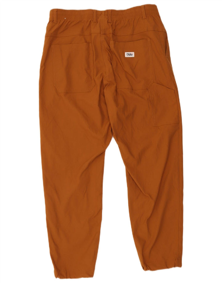 Pantaloni cargo Nike da uomo Dri Fit slim grandi W36 L29 marrone poliammide