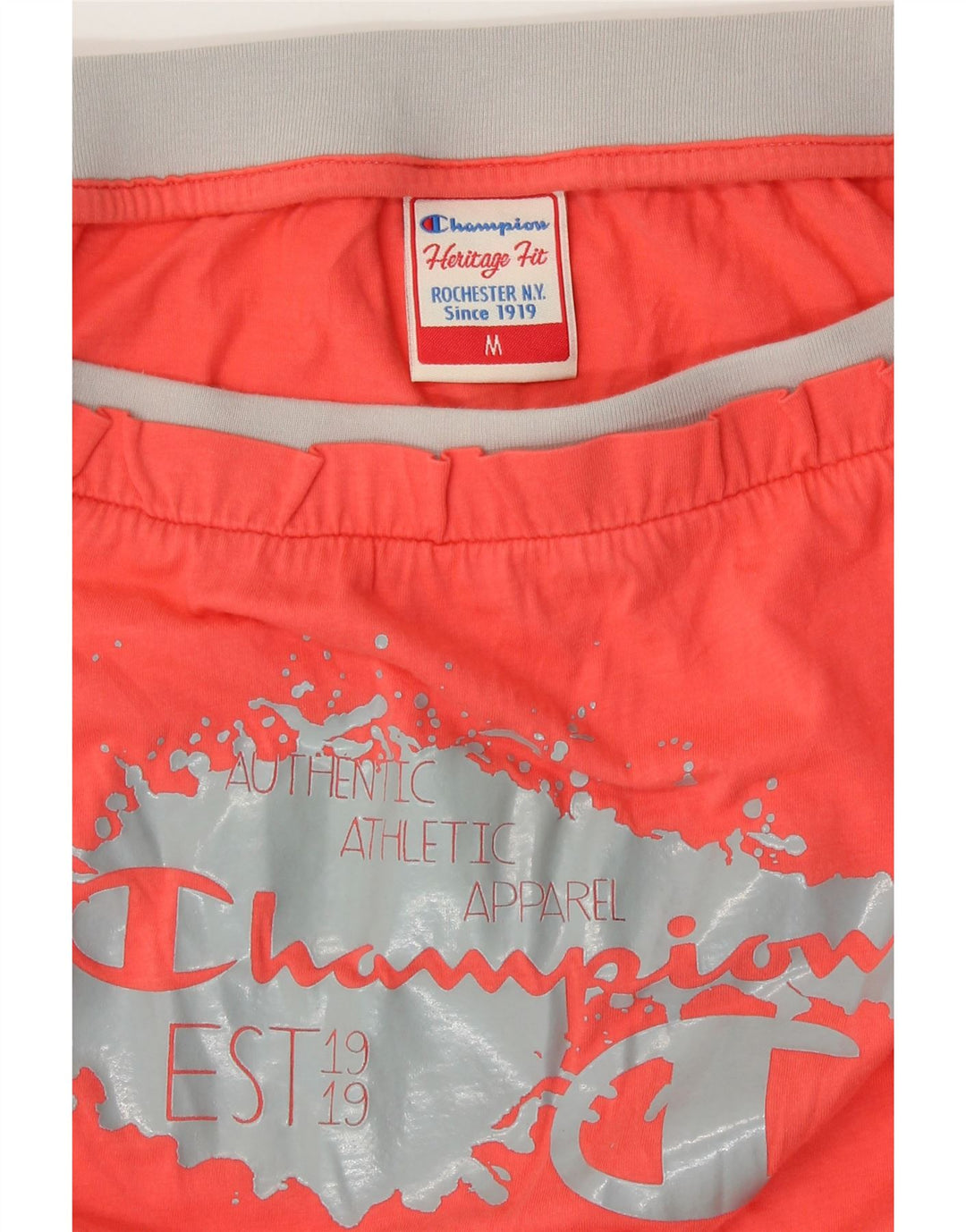 Tuta corta da donna con spalle scoperte con grafica Champion UK 12 arancione medio