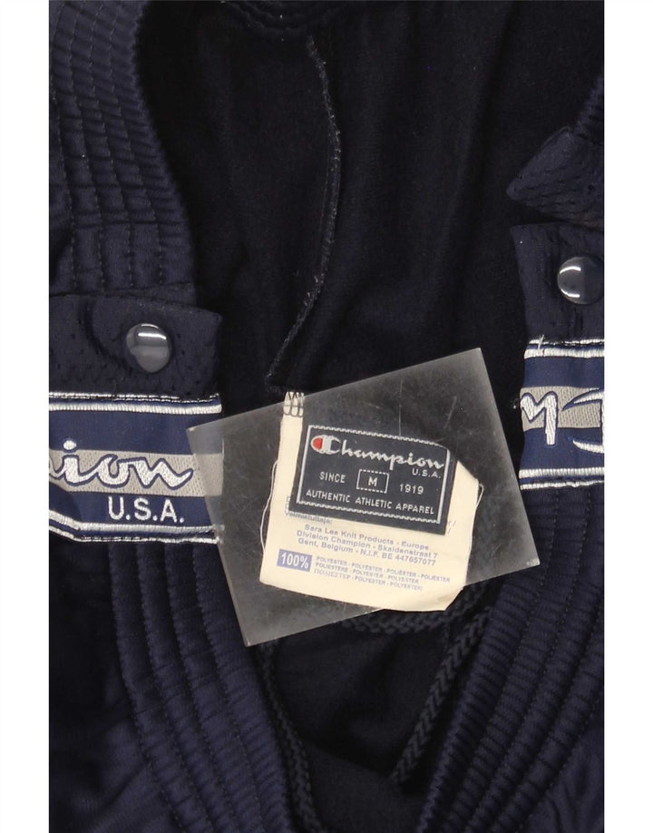 Pantaloni da tuta con grafica Champion da donna UK 12 Medio Blu Navy