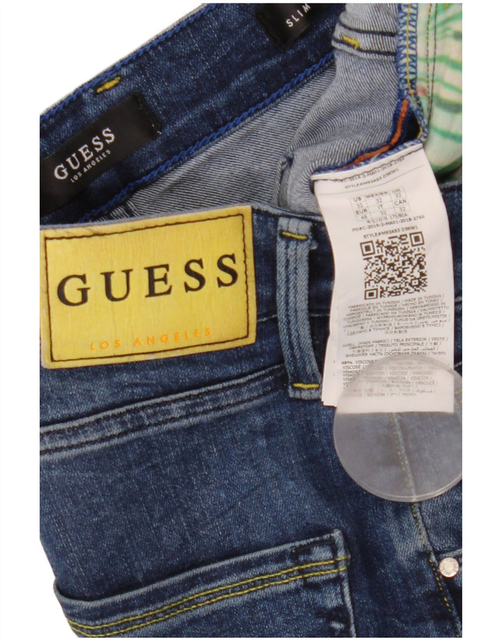 Jeans slim invecchiati da uomo Guess W32 L33 viscosa blu