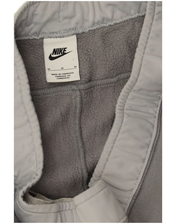 Pantaloni da tuta da uomo Nike Joggers in cotone color block grigio medio