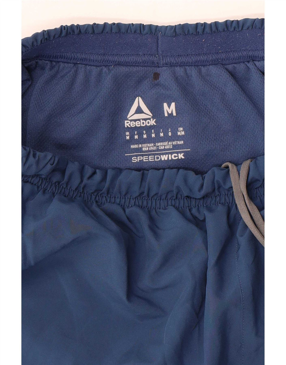 Pantaloncini sportivi Reebok Speedwick da uomo medio blu navy