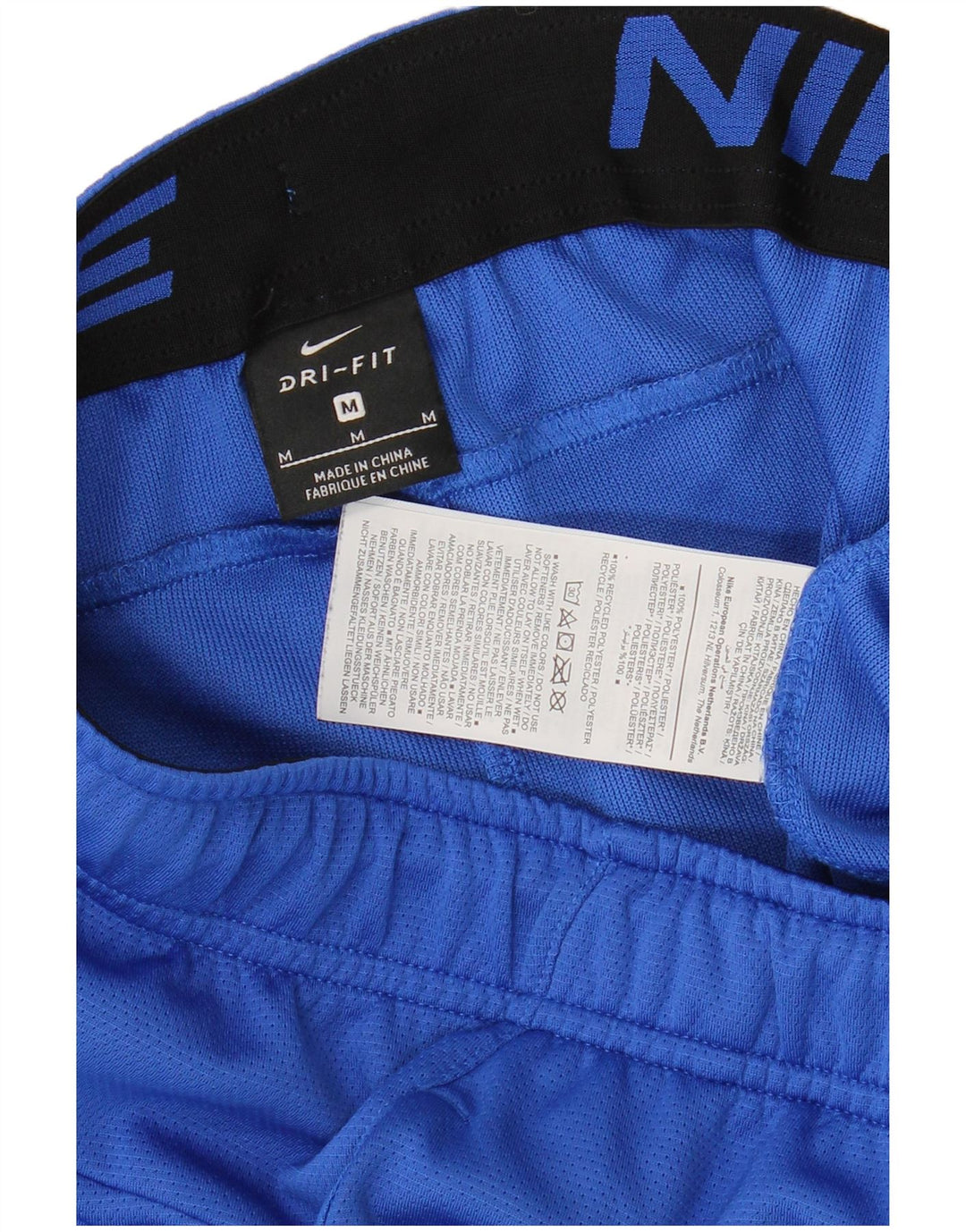 Pantaloncini sportivi Nike Dri Fit da uomo in poliestere color block blu medio