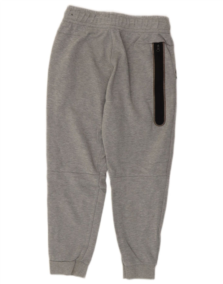 Pantaloni da tuta da ragazzo Nike Joggers 10-11 anni Grigio medio chiazzato