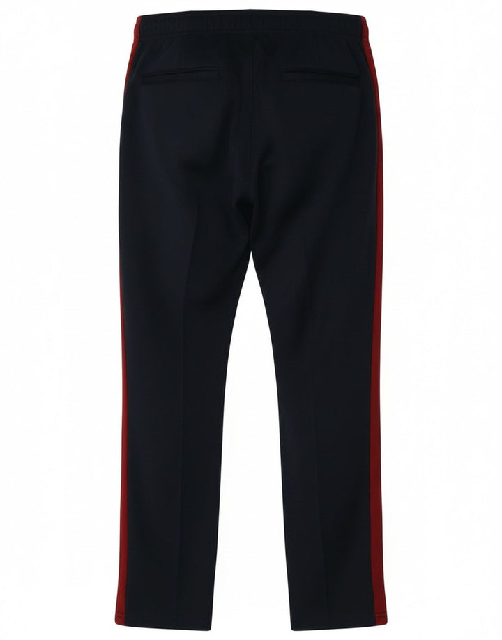 Pantaloni della tuta da ragazzo Ellesse 13-14 anni Blu navy Colourblock