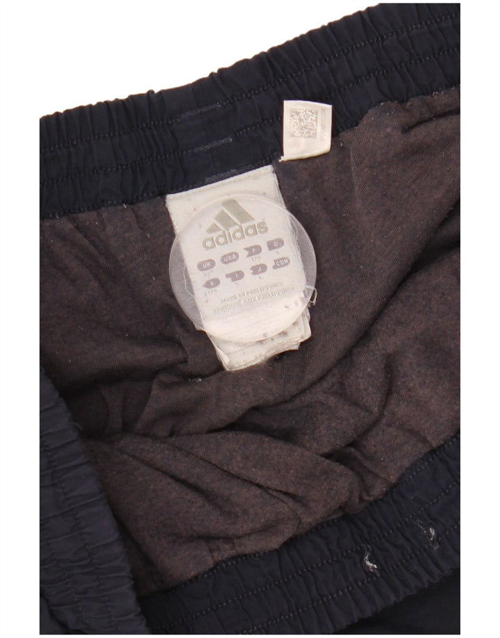 Pantaloni da tuta da uomo ADIDAS Carrot Joggers medio poliestere blu navy