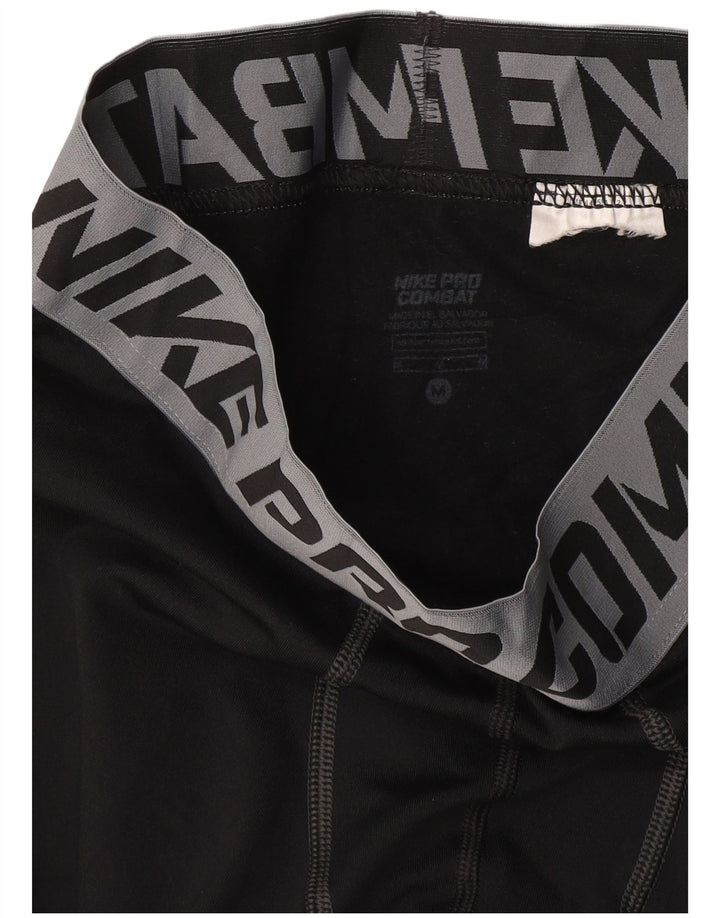 Leggings grafici Nike da uomo di colore nero medio