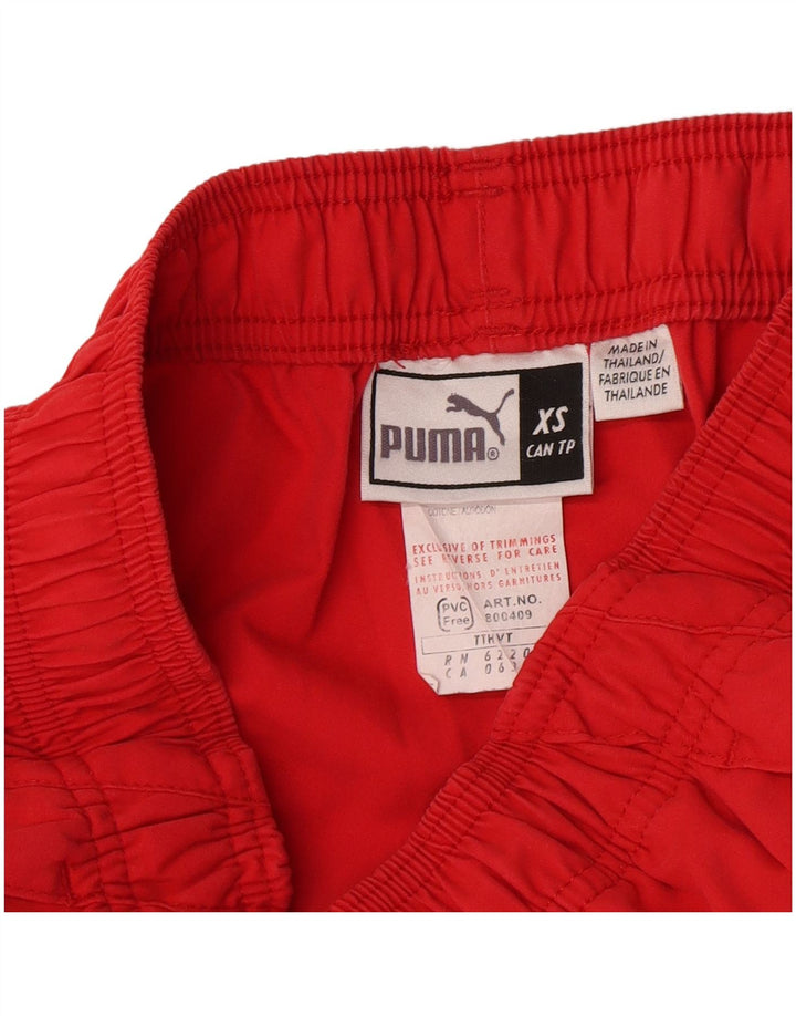Pantaloni della tuta Puma da donna Capri UK 6 XS rosso poliestere
