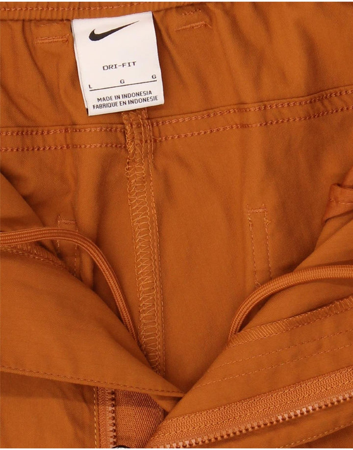 Pantaloni cargo Nike da uomo Dri Fit slim grandi W36 L29 marrone poliammide