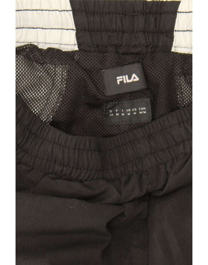 FILA Mens Tracksuit Trousers Medium  Black Colourblock Polyester Vintage Fila and Second-Hand Fila from Messina Hembry 
