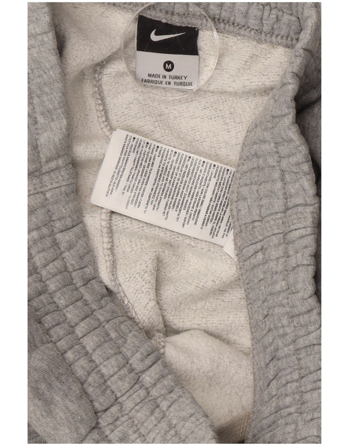 Pantaloni da tuta da uomo Nike Joggers in cotone chiazzato grigio medio