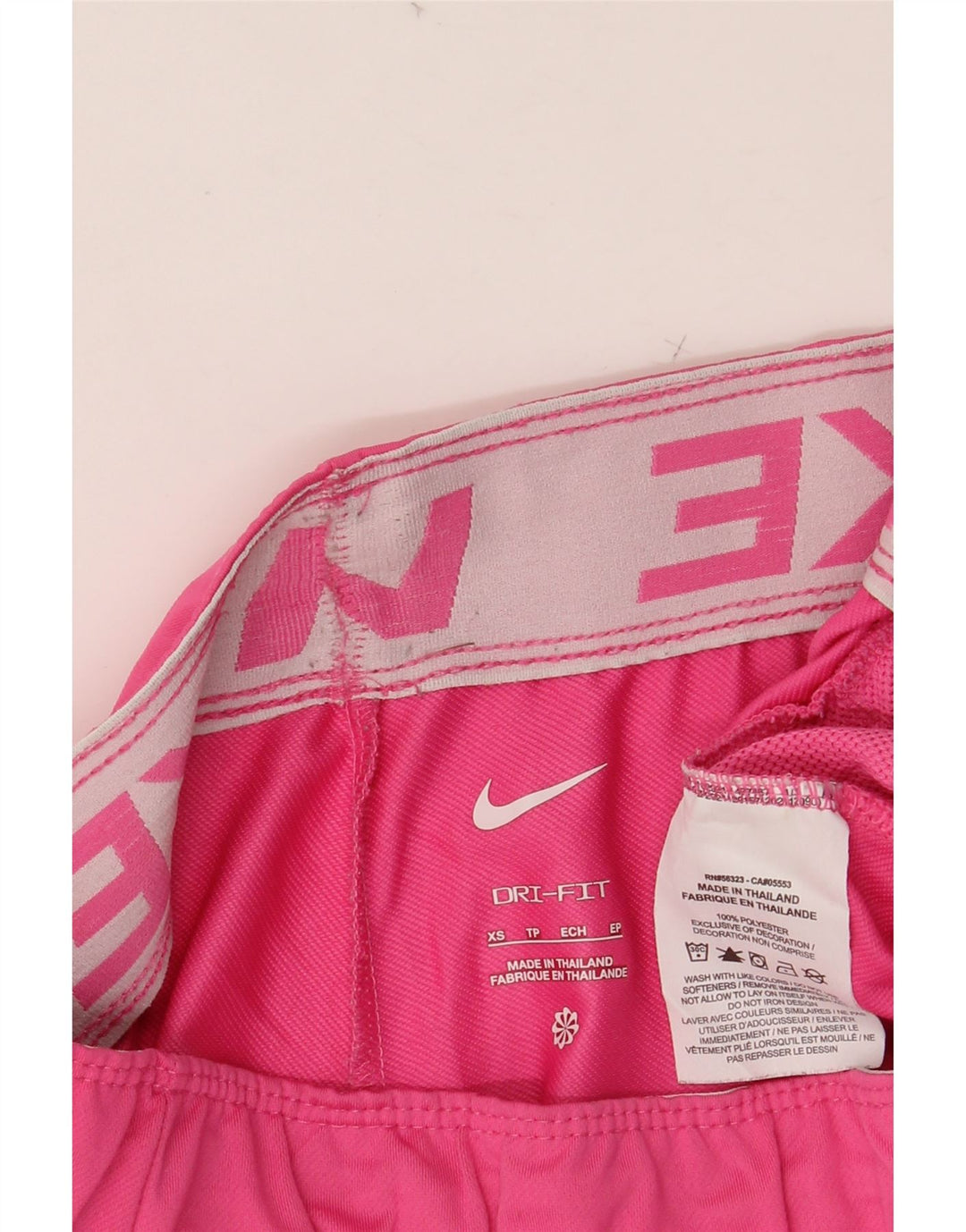 Pantaloncini sportivi NIKE Dri Fit da donna UK 4 XS poliestere rosa