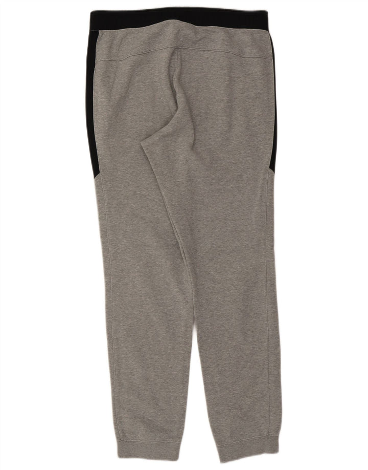 Pantaloni da tuta da uomo Nike Joggers in cotone color block grigio medio