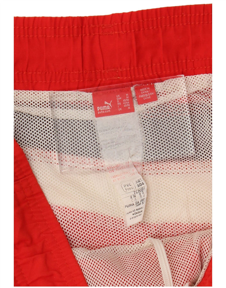 Pantaloncini da bagno grafici da uomo Puma in poliestere color block rosso medio