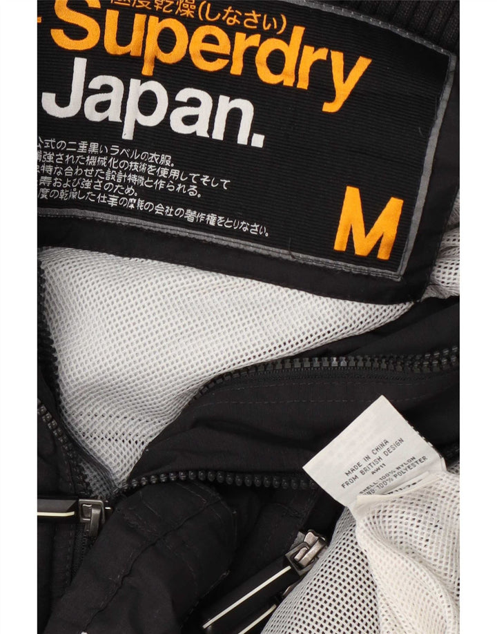 Giacca antipioggia da donna Superdry UK 14 media nera