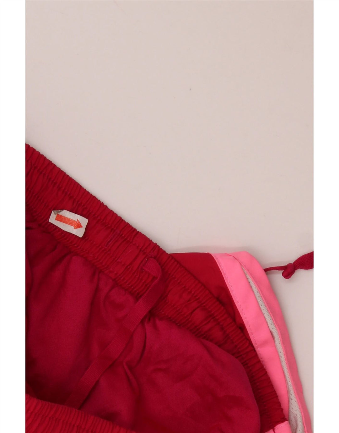 Pantaloncini sportivi NIKE da donna Dri Fit UK 10 piccoli in poliestere color block rosso