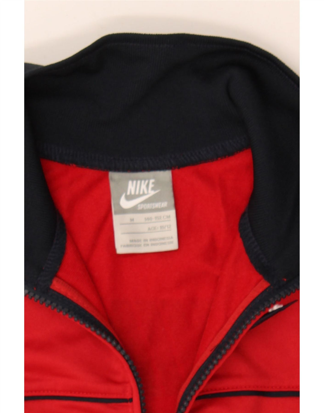 NIKE Boys Graphic Tracksuit Top Jacket 10-11 Years Medium  Red Colourblock Vintage Nike and Second-Hand Nike from Messina Hembry 