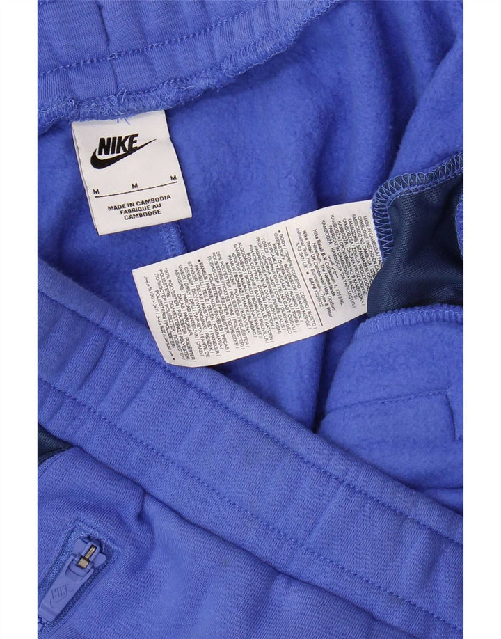 Pantaloni da tuta da uomo Nike Joggers in cotone color block blu medio