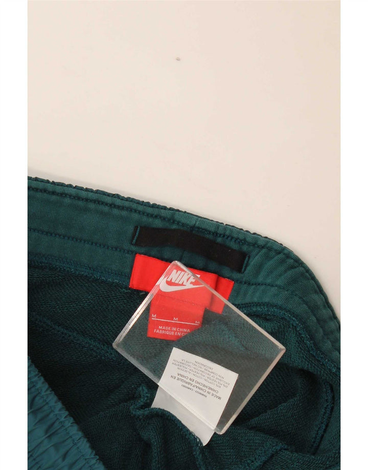 Pantaloni da tuta da uomo Nike Joggers in cotone verde medio