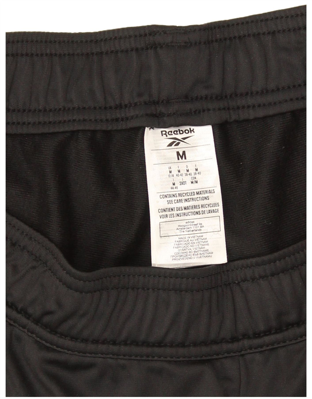 Pantaloni da tuta da donna Reebok Joggers UK 12/14 Medium Nero Poliestere
