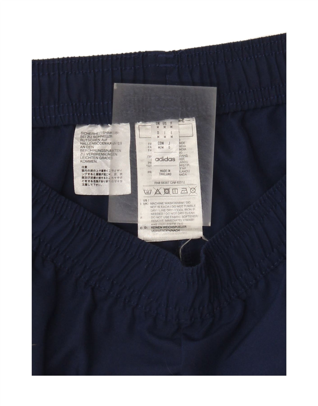 Pantaloni da tuta da uomo Adidas medi in poliestere blu navy