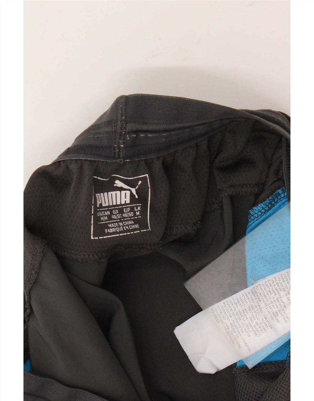 Pantaloncini sportivi da uomo Puma in poliestere color block grigio medio