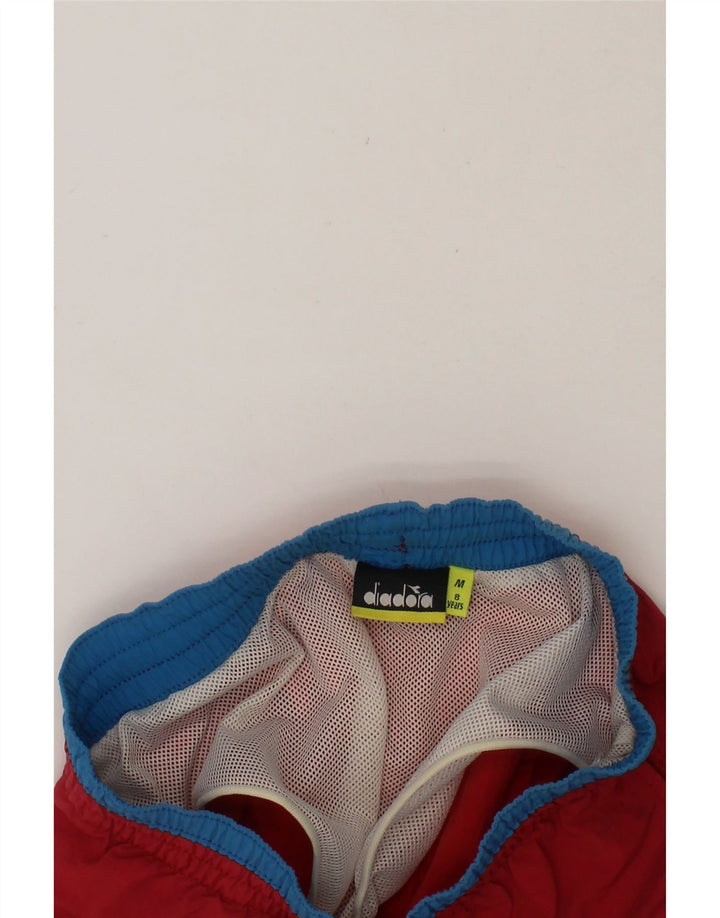 DIADORA Boys Swimming Shorts 7-8 Years Medium Red Colourblock Vintage Diadora and Second-Hand Diadora from Messina Hembry 