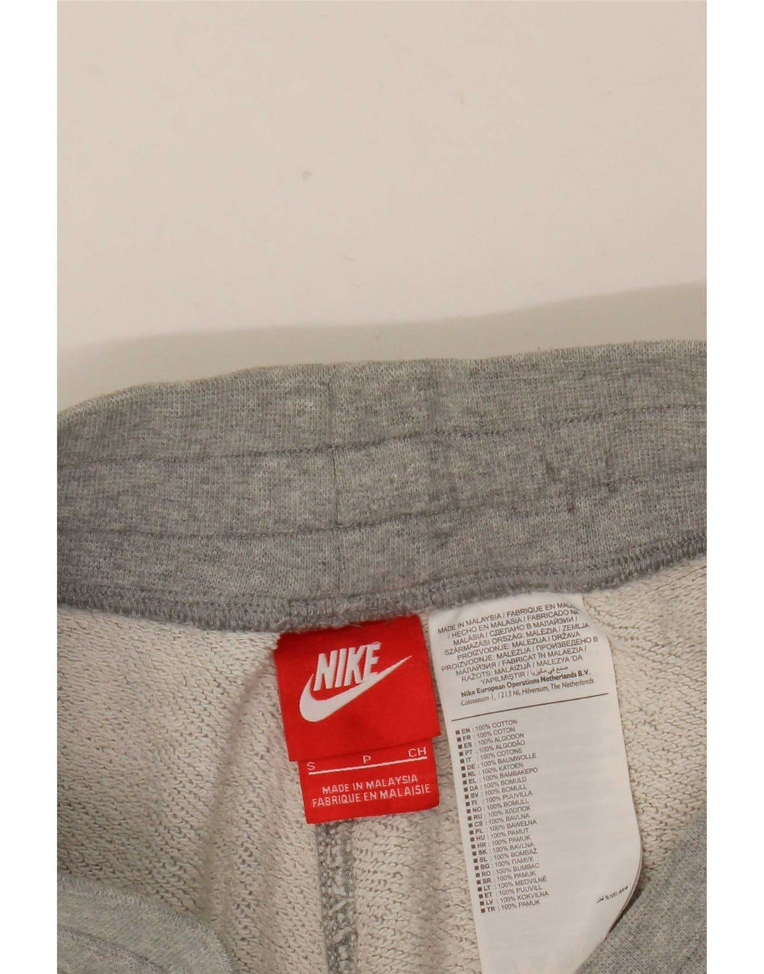 Pantaloncini sportivi Nike da uomo con grafica piccola in cotone grigio