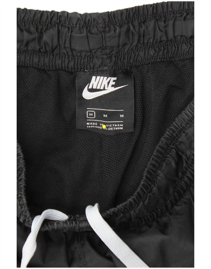 Pantaloni impermeabili Nike da donna, vestibilità ampia, UK 14, nylon nero medio