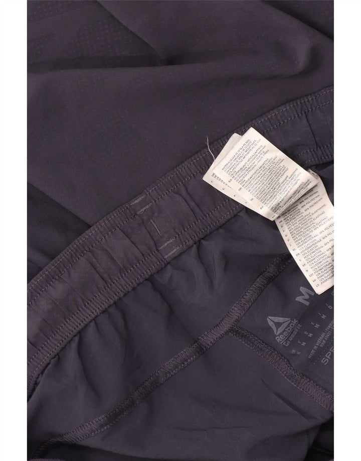 Pantaloncini sportivi Reebok Speedwick Graphic da uomo in poliestere mimetico grigio medio