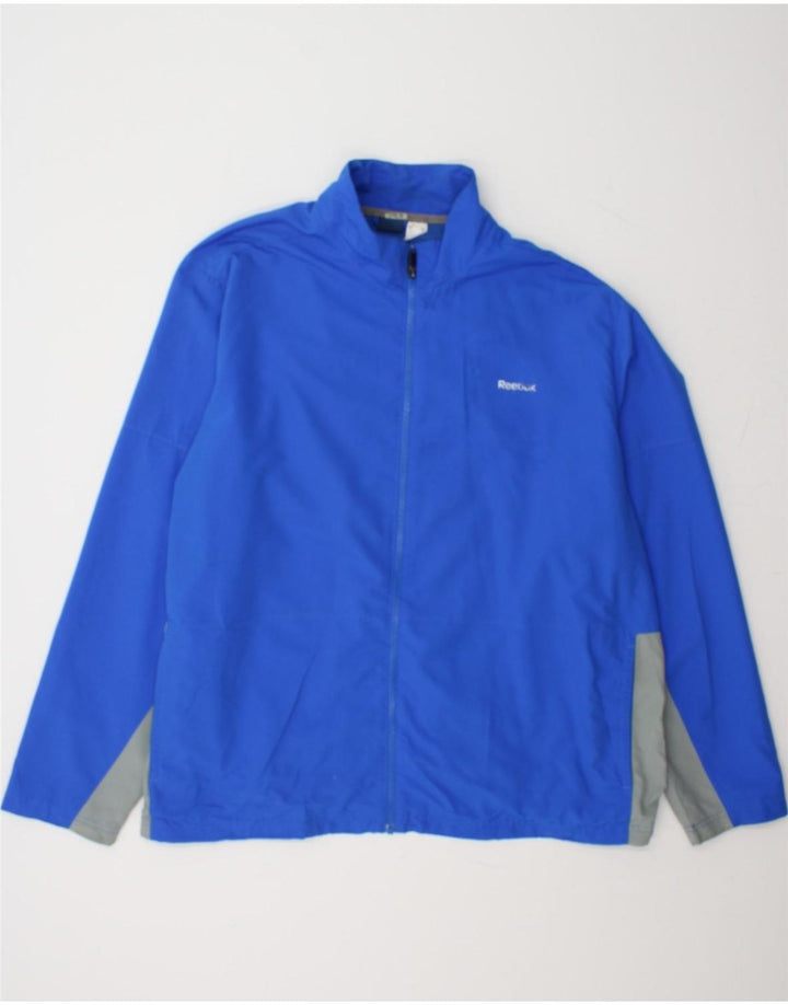 REEBOK Mens Tracksuit Top Jacket 2XL Blue Colourblock Polyester Vintage Reebok and Second-Hand Reebok from Messina Hembry 