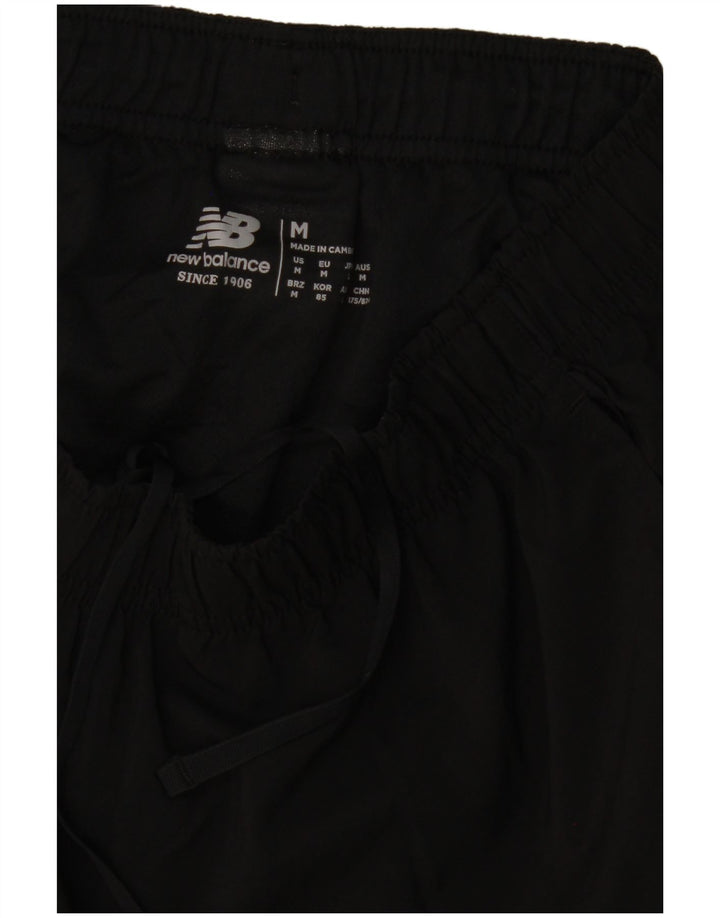 Pantaloncini sportivi da uomo New Balance medi neri