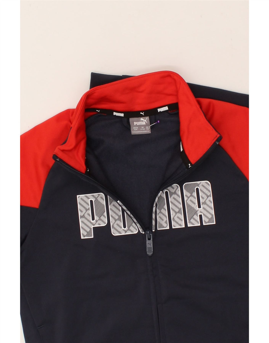 PUMA Boys Graphic Tracksuit Top Jacket 9-10 Years  Navy Blue Colourblock Vintage Puma and Second-Hand Puma from Messina Hembry 