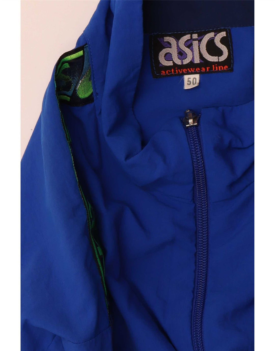 Giacca sportiva da uomo con grafica Asics IT 50 Colorblock blu medio