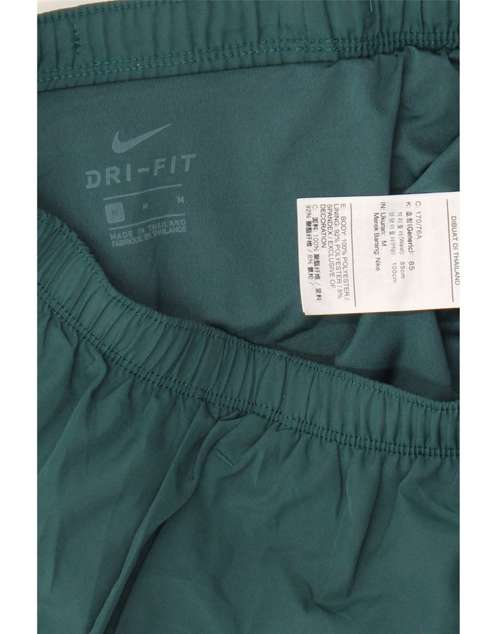 Pantaloncini sportivi Nike Dri Fit Graphic da uomo in poliestere color block verde medio