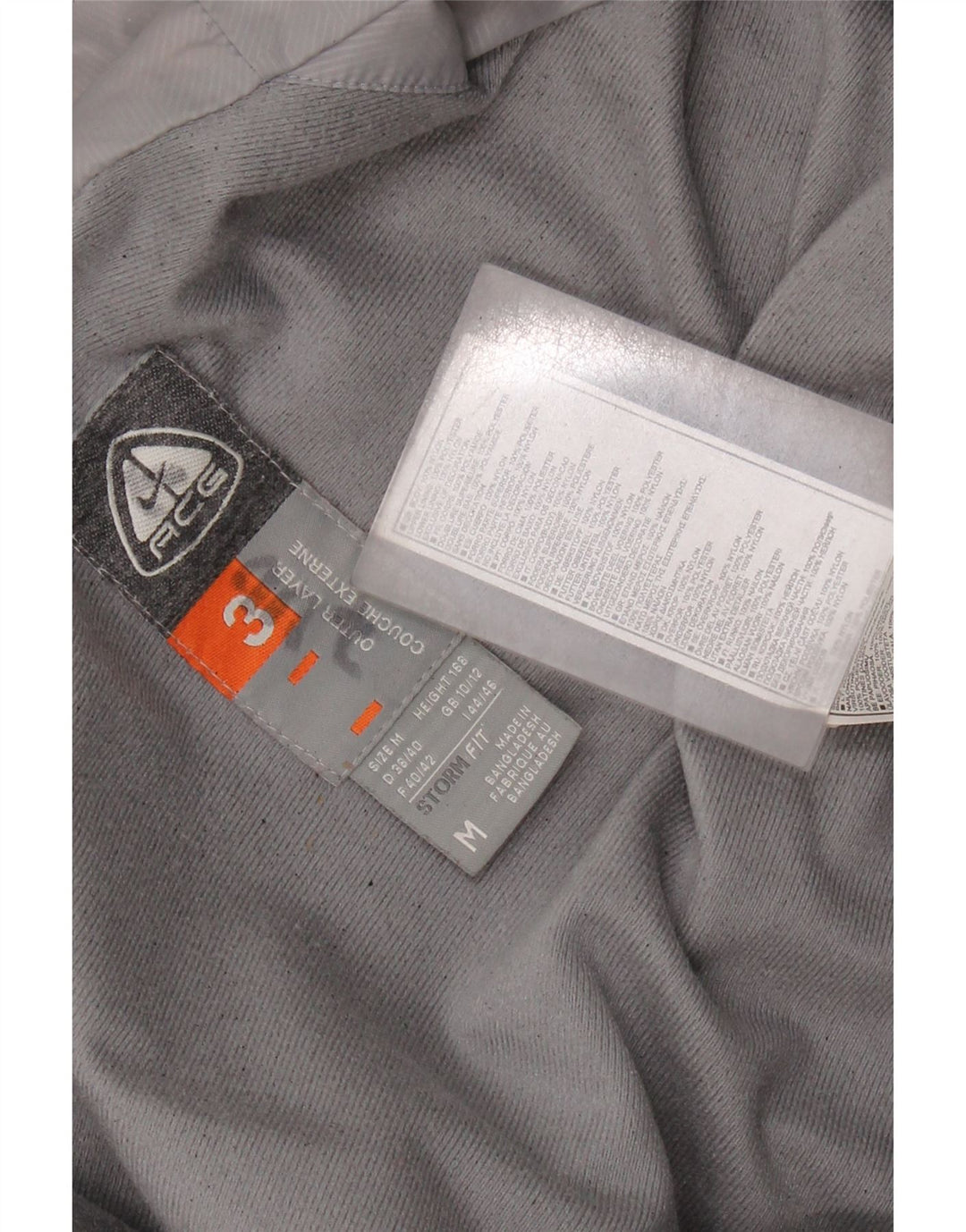 Giacca a vento NIKE Storm-Fit da donna UK 14 Medium Red Colourblock