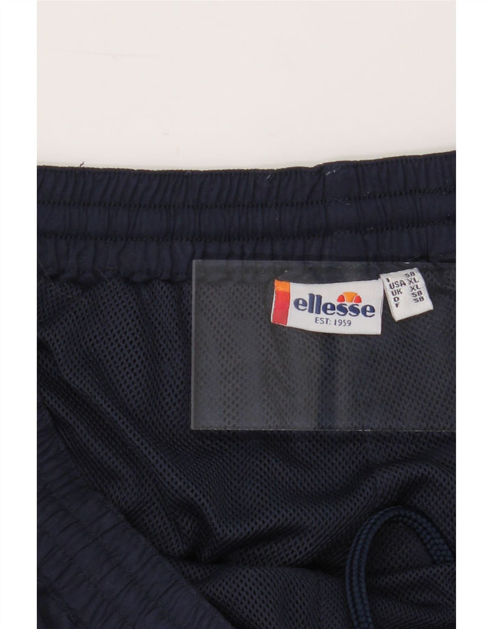 ELLESSE Mens Tracksuit Trousers XL Navy Blue Polyester Vintage Ellesse and Second-Hand Ellesse from Messina Hembry 