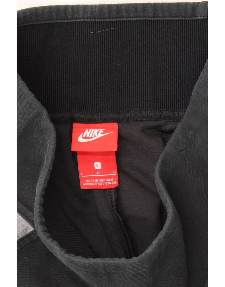 NIKE Womens Graphic Tracksuit Trousers Joggers Large  Black Colourblock Vintage Nike and Second-Hand Nike from Messina Hembry 