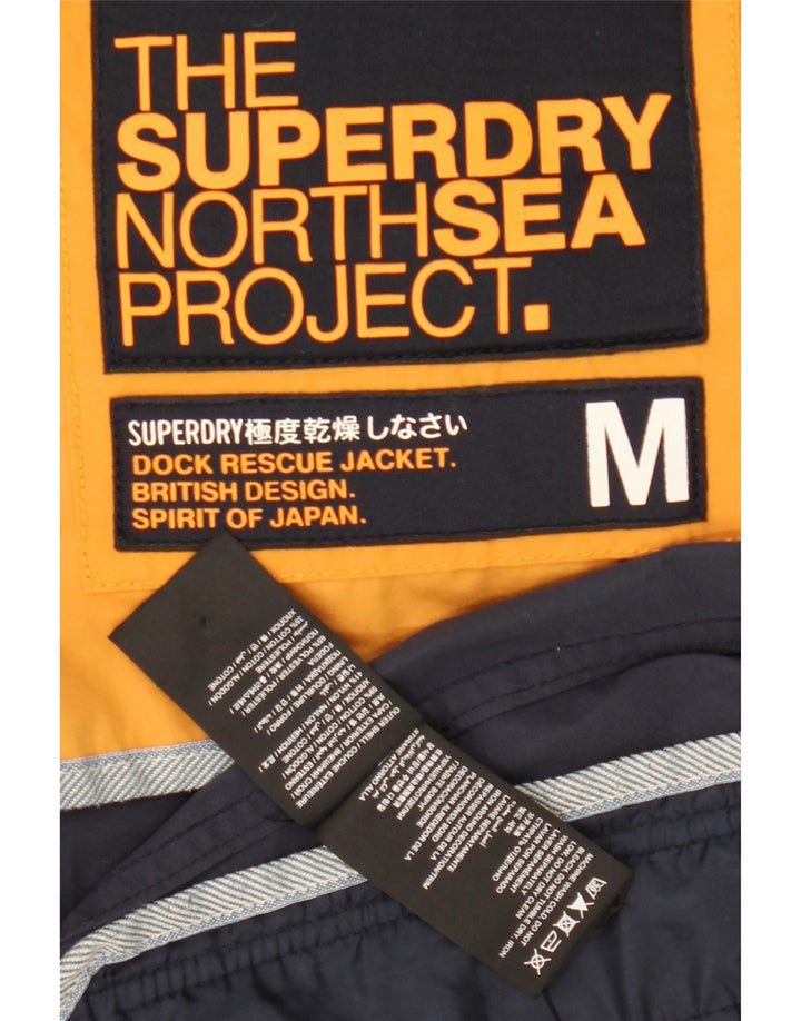 Giacca a vento con cappuccio da uomo Superdry UK 38 Medium Navy Blue Colourblock