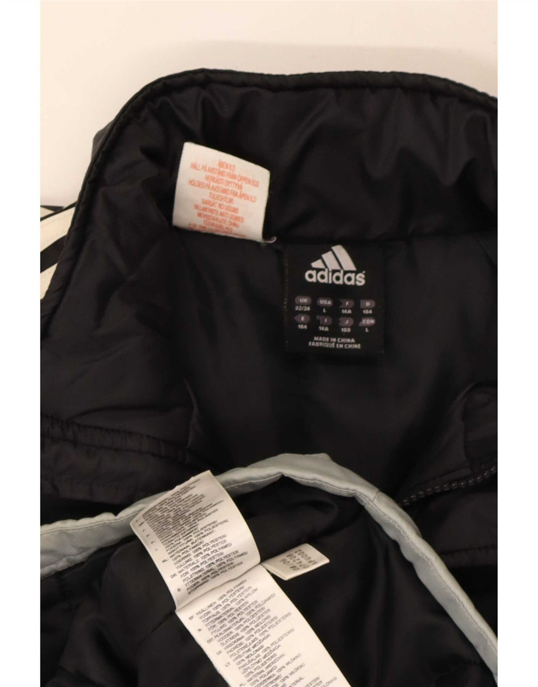 Giacca a vento Adidas da ragazzo 13-14 anni in poliestere color block nero