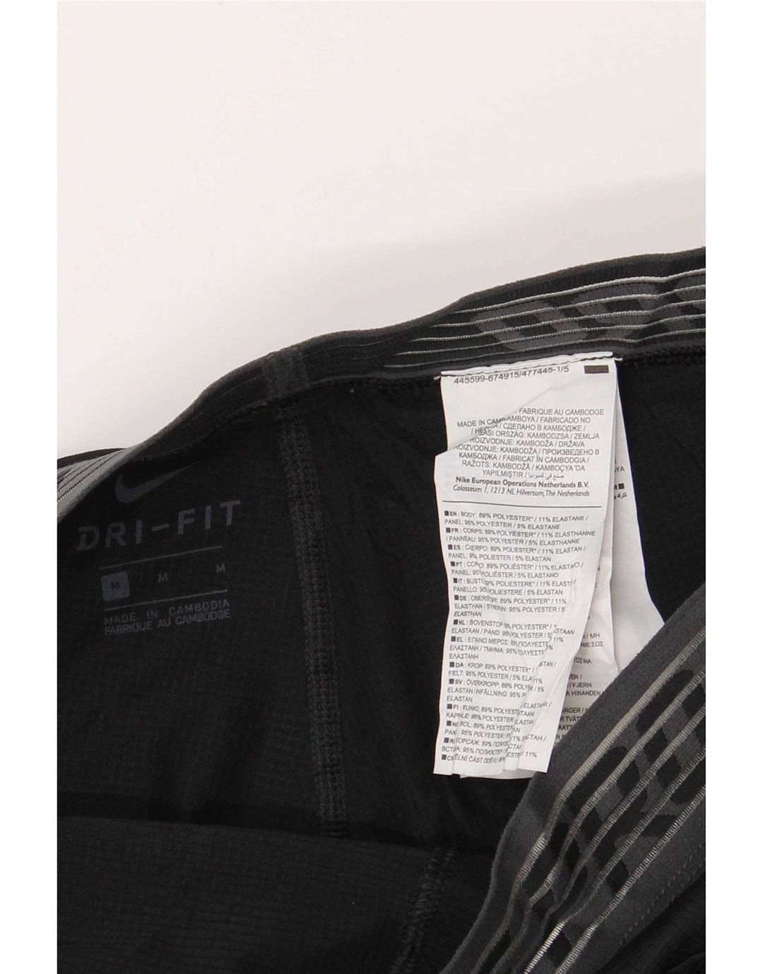 Leggings grafici Nike Dri Fit da uomo in poliestere nero medio