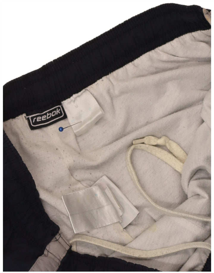 Pantaloni da tuta Reebok da uomo cargo color block blu navy medio